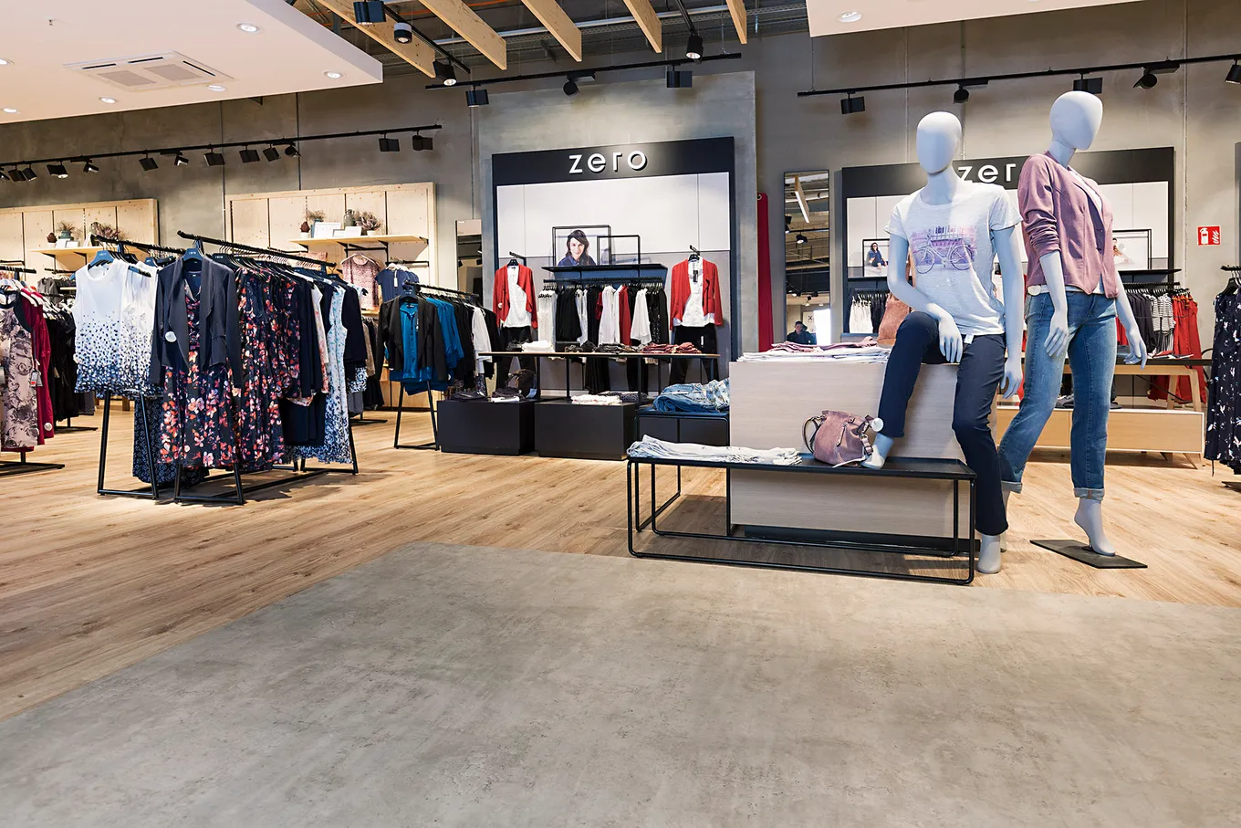 wineo Purline Bioboden Holzoptik und Bahnware Akzente Modegeschäft